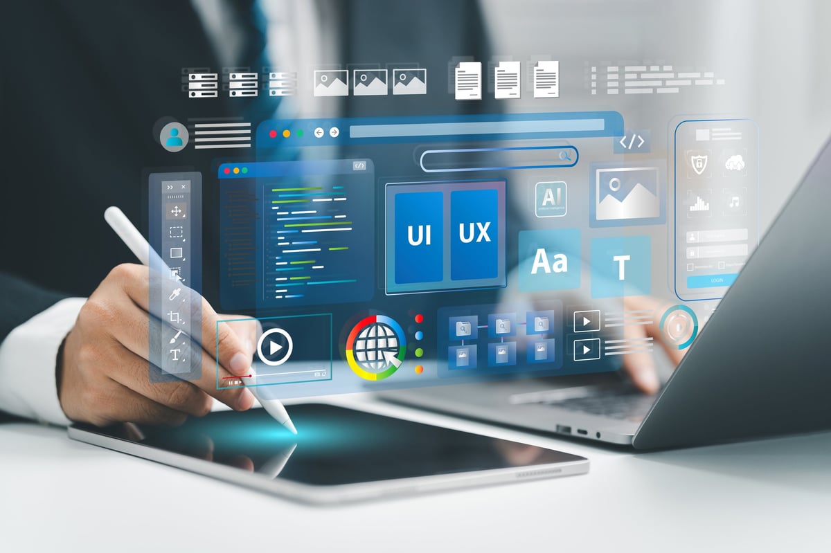 Web developer working on website design with holographic displays of code and data